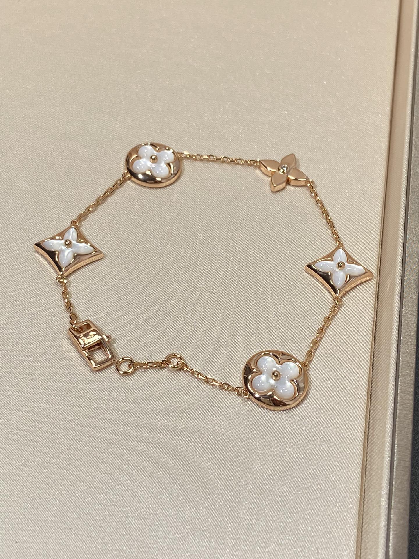 [kincade]STAR AND SUN 5 MOTIF MOP PINK GOLD BRACELET