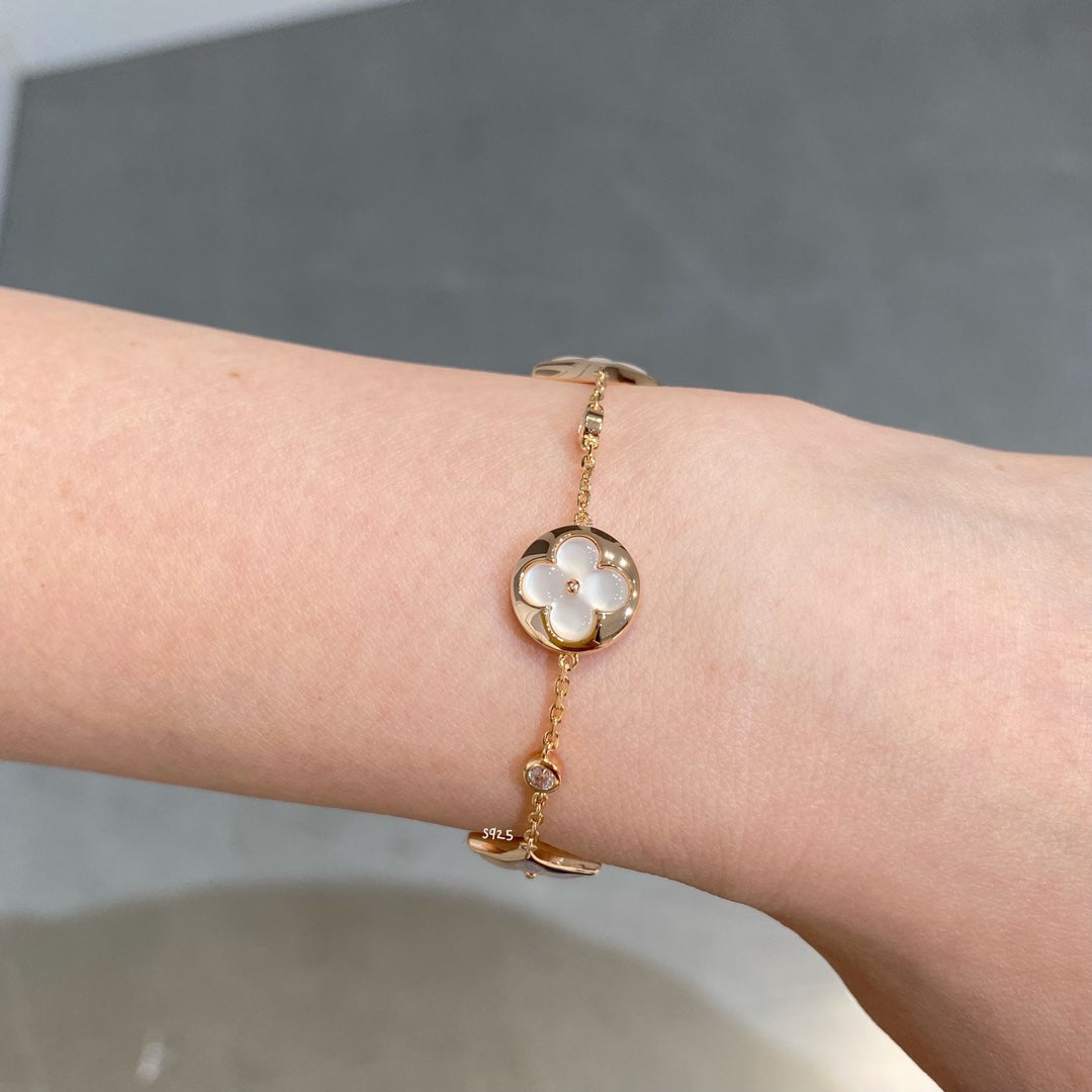 [kincade]STAR AND SUN 4 MOTIF WHITE MOP PINK GOLD BRACELET