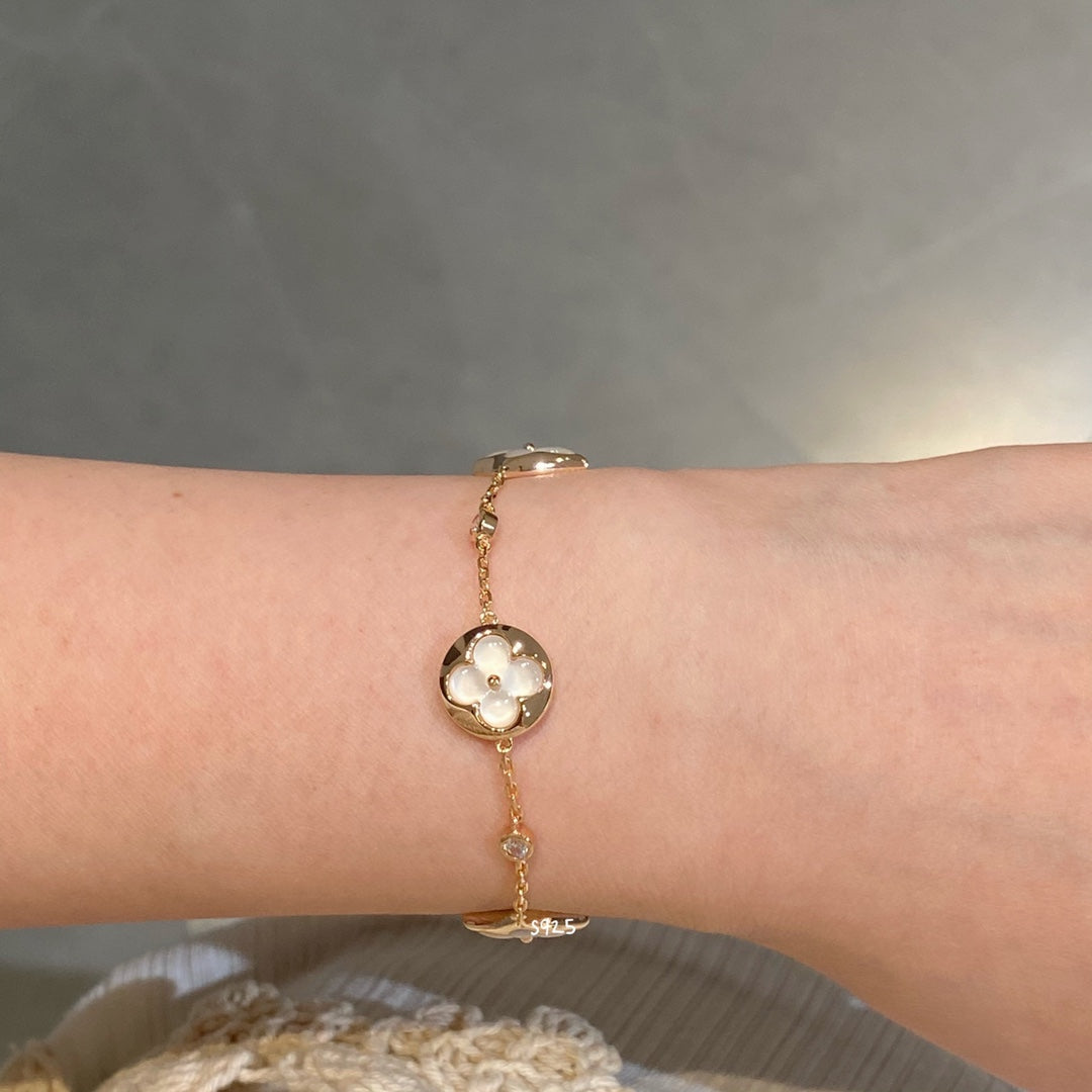 [kincade]STAR AND SUN 4 MOTIF WHITE MOP PINK GOLD BRACELET