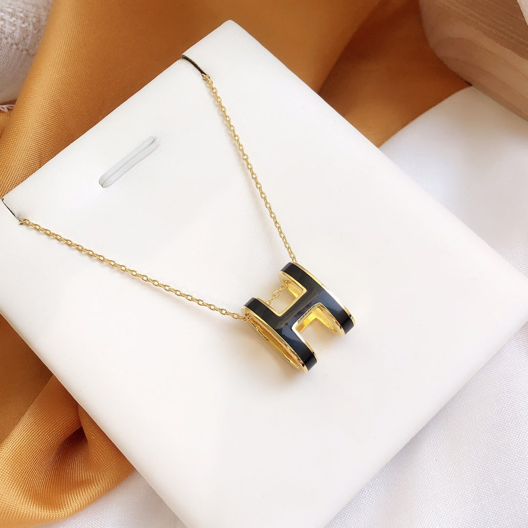 [kincade]HM CLIC BLACK ENAMEL GOLD NECKLACE